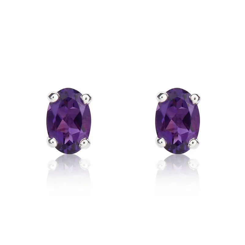 9ct White Gold Amethyst 6x4mm Oval Claw Set Stud Earrings