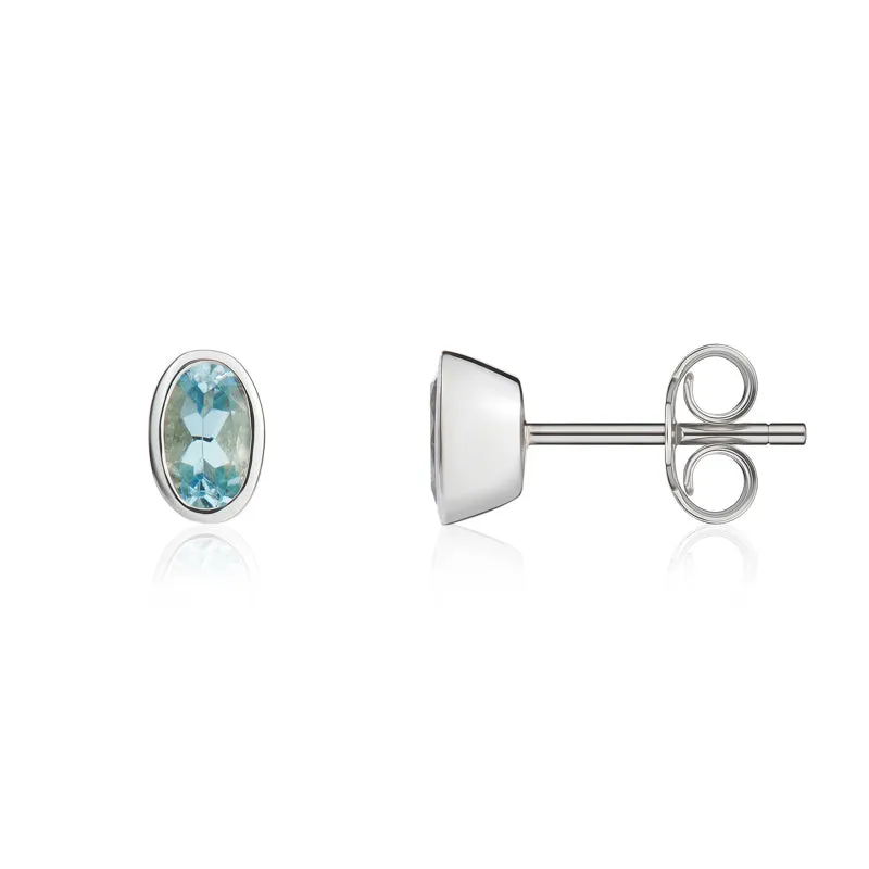 9ct White Gold Aquamarine 5x3mm Oval Rub Over Set Stud Earrings