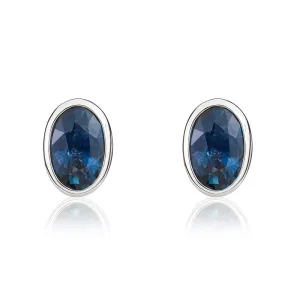9ct White Gold Sapphire 6x4mm Oval Rub Over Set Stud Earrings