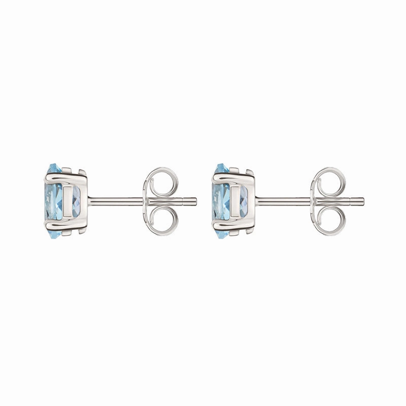9ct White Gold Aquamarine 7x5mm Oval Claw Set Stud Earrings