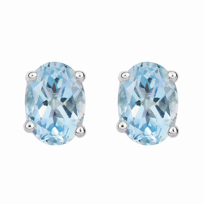 9ct White Gold Aquamarine 7x5mm Oval Claw Set Stud Earrings